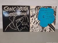 Front covers of both LPs