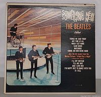 Back cover of Something New LP showing band photo, track list and Capitol Records logo