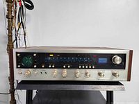 Front view of Pioneer QX-747 receiver on shelf