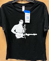 Full front view of black t-shirt with Buddy Holly graphic