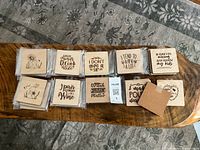 Overview of all packaged wooden coasters on table