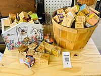 Blocks, baskets and photo holders grouped on table