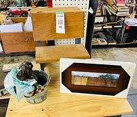 All three items grouped: miniature desk, tin pail, framed print