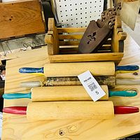 Overall lot showing apple basket, scissor holder and five rolling pins