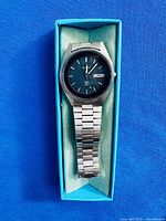 Full view of Pulsar wristwatch in turquoise box
