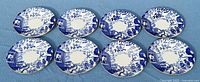 Eight blue and white Mikado plates arranged in two rows