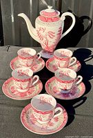 Full coffee set with coffee pot, five cups, five saucers displayed