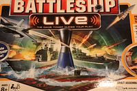 Box lid showing Battleship Live branding