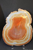 Front of polished agate slice on stand