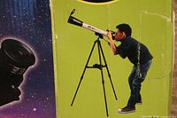 Retail box front showing Edu Science 50-600 telescope image