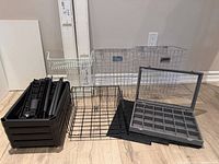 All items grouped: wire baskets, spice rack, unassembled tower parts, jewelry case, felt liners, cable raceways