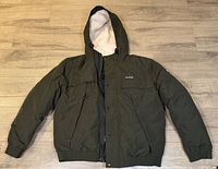 Front view of olive winter jacket with hood displayed