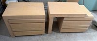 pair of light wood side tables with topper panel positioned