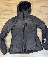 Full front view of charcoal The North Face ski jacket showing hood, quilting, front zipper and pockets