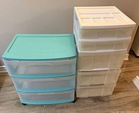 Front view of both rolling storage carts showing drawer count and colors