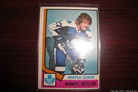 Front of Darryl Sittler 1974-75 Topps hockey card in sleeve