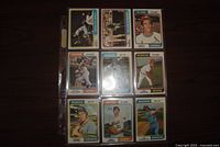 All nine 1974 baseball cards in protective binder sleeve