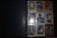 Nine Blue Jays cards in 9-pocket sleeve within binder