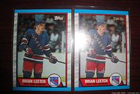 Front view of two Brian Leetch rookie cards, Topps and O-Pee-Chee variants