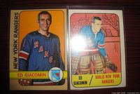 Fronts of both Ed Giacomin hockey cards in sleeves