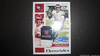 Front of Panini Chronicles Tom Brady relic/autograph card showing jersey patch and signature