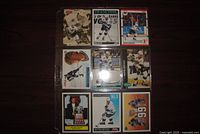 Single image showing all nine Gretzky cards within a plastic binder page