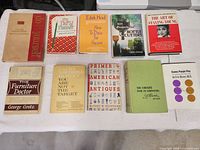 All ten books laid out showing front covers