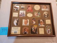 Front view of wooden multi-opening family photo frame showing mat layout and brand tag