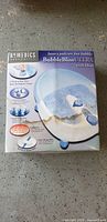 Box front showing Homedics BubbleBliss Ultra with Heat model