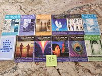 All items laid out showing covers: 10 magazines and Home Medicine Guide