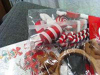 Bag of candy ornaments and partial view of sticker sheet