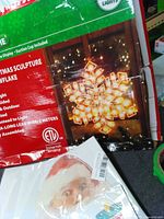 Box showing LED snowflake window light