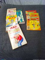 All seven books laid out on table