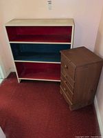 Bookcase and chest together showing size relation