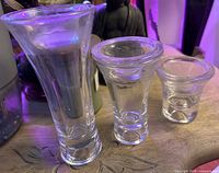 Front view of all three vases showing size differences