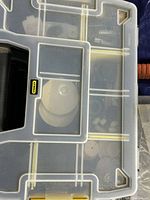 Top view of organizer showing clear lid, Stanley logo, internal compartments