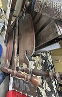 Headboard and footboard showing turned posts and oval panels