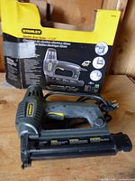 Stanley brad nailer with retail box showing front of tool and packaging