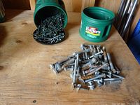 Overall view with coffee tubs showing green deck screws and lag screws