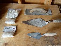 Tile tools and spacers on bench