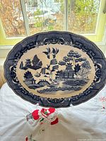 Front view of oval Blue Willow platter displaying full pattern