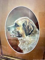 Close view of Saint Bernard portrait within oval matte