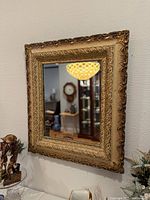 Front view of rectangular mirror hanging on wall