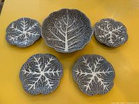 Full set of five Bordallo Pinheiro cabbage pieces on tabletop