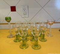 Group of 10 Bormioli Rocco cordial glasses with two additional assorted stemmed glasses