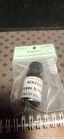 Front view of sealed Avalon Alchemy benzoin essential oil bottle in bag