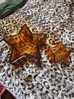 large and small amber star dishes top view
