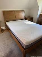 Actual Dawson queen bed with memory foam mattress in room