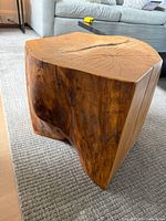Overall view of solid wood stump side table front and top
