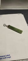 Front view of green aventurine pendant with silver bail